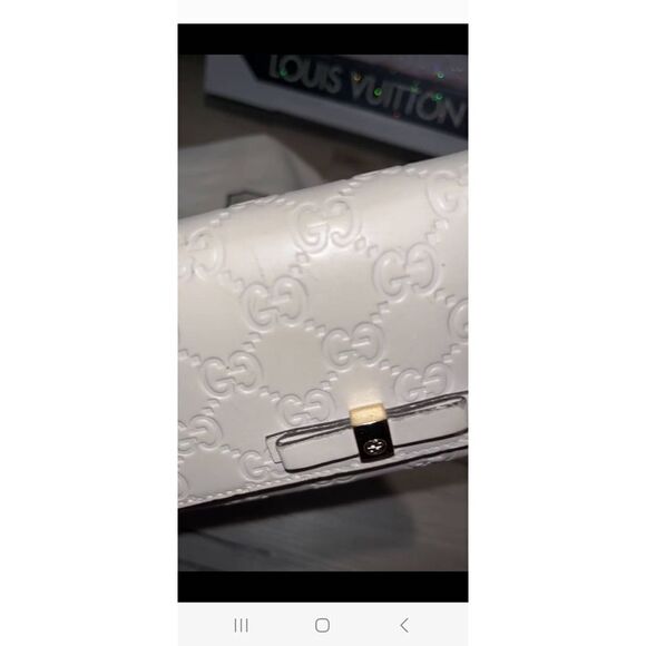 GUCCI Guccisima White Calfskin
Leather Bow Wallet Full Inclusion - Picture 12 of 13